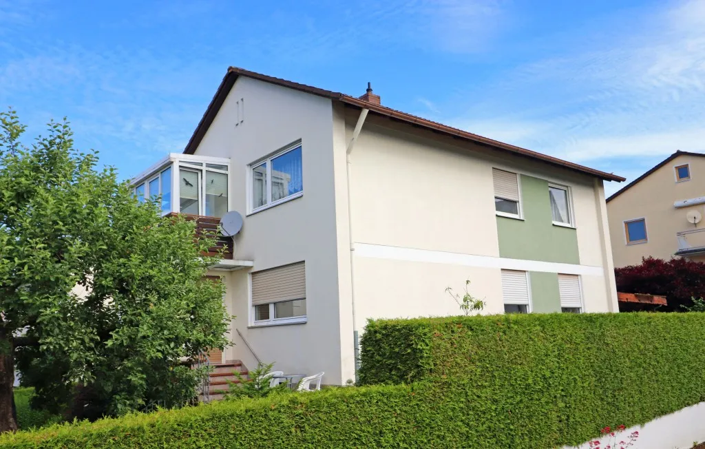 Top Lage in Weiden Ost! Ansprechendes Ein- oder Zweifamilienhaus mit Garage und Wintergarten – Bild 1