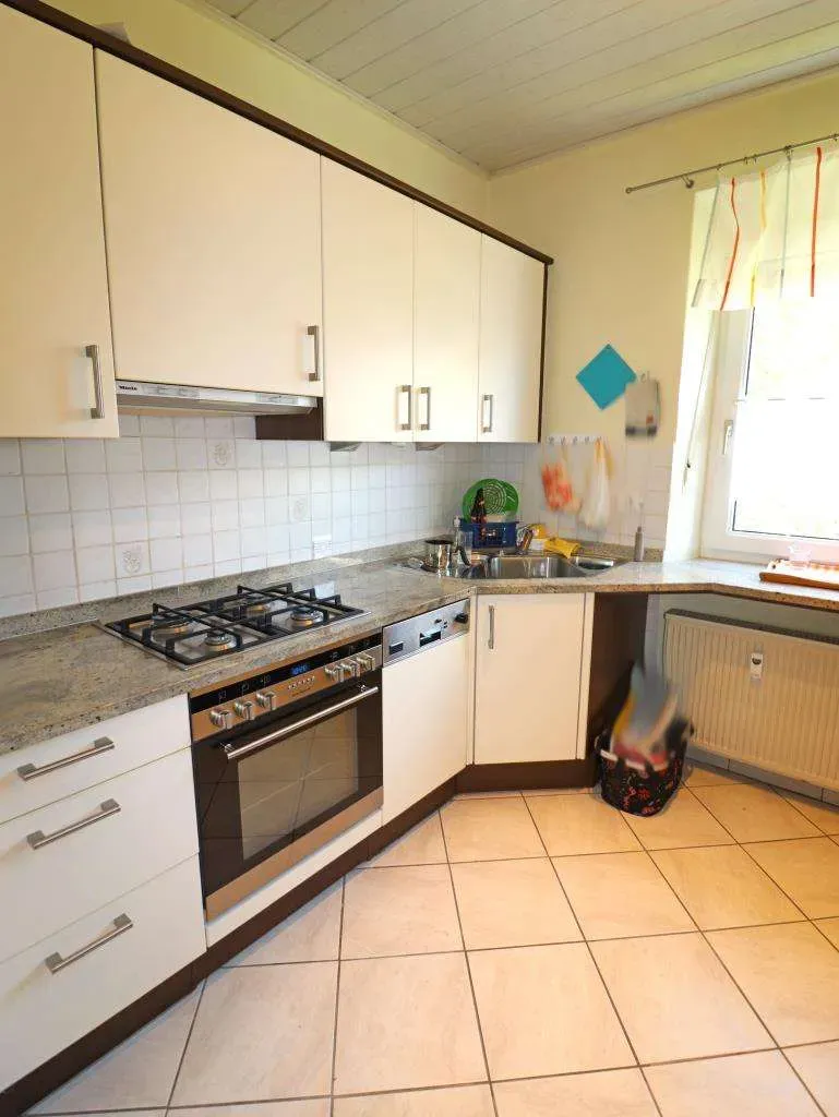 TOP Lage geboten! Gepflegtes Mehrfamilienhaus, 5 Wohnungen mit Garten und Garage – Bild 10
