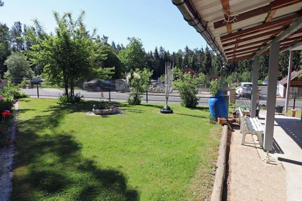 TOP! Saniertes Wohnhaus mit großem Carport, die Fassade, das Dach u. der Garten erneuert – Bild 4