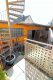 Außenfassade und Balkone erneuert! Ansprechendes Wohnhaus mit verlängerter Garage und Gartenhaus - Balkon mit Rundtreppe