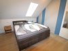 Ihr neues Zuhause! Modernes Wohnhaus mit Doppelgarage, EBK, Kaminofen und PV-Anlage. - Schlafzimmer