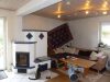Aufgepasst!!! Freistehendes Wohnhaus, energetisch saniert, mit Carport, Terrasse und Garten - Wohnzimmer mit Kachelofen